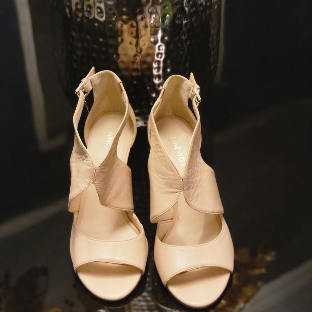 Nude Nine West pumps size 9.